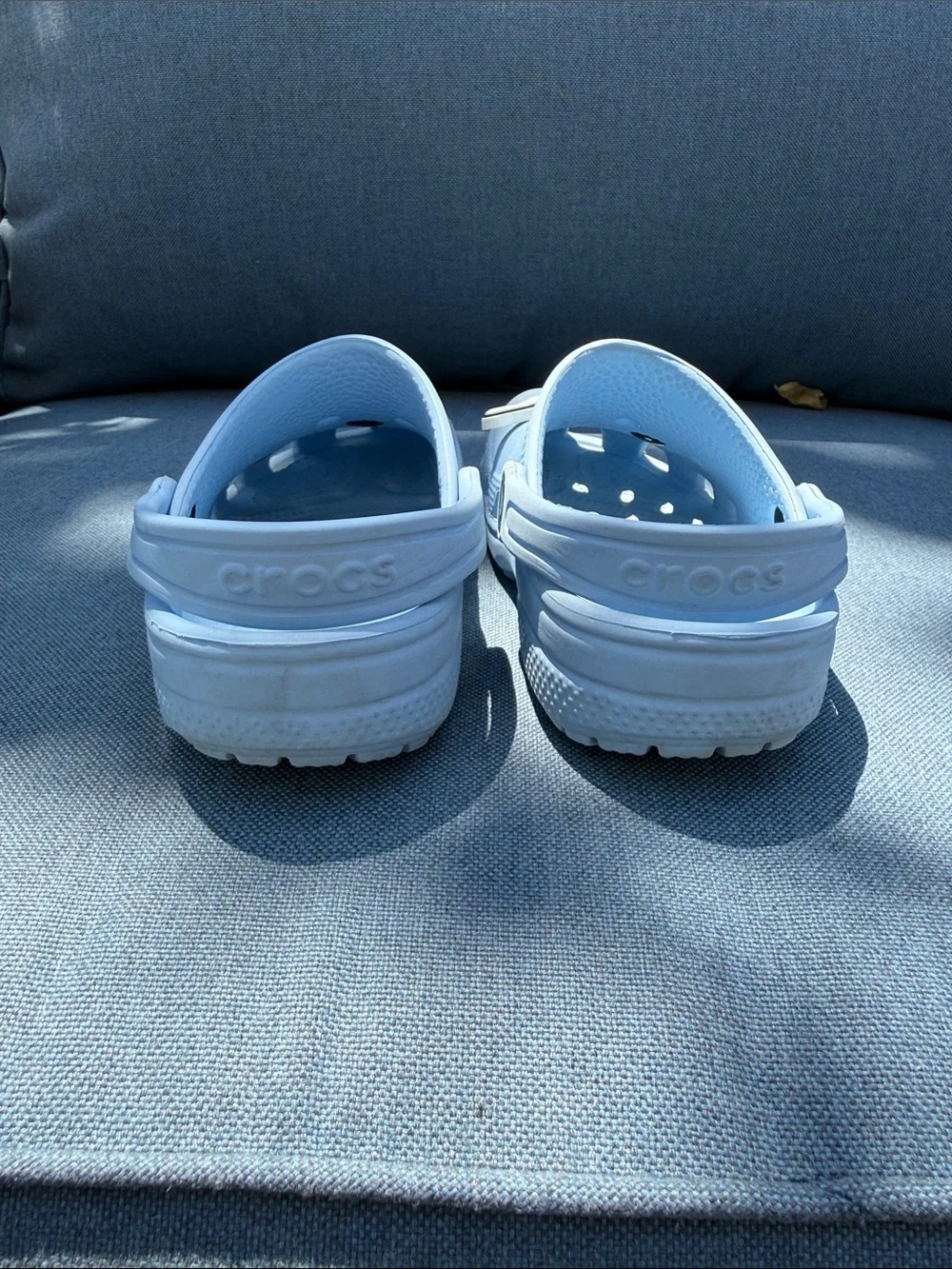 CROCS Kids Light Blue Clogs with Character Jibbitz